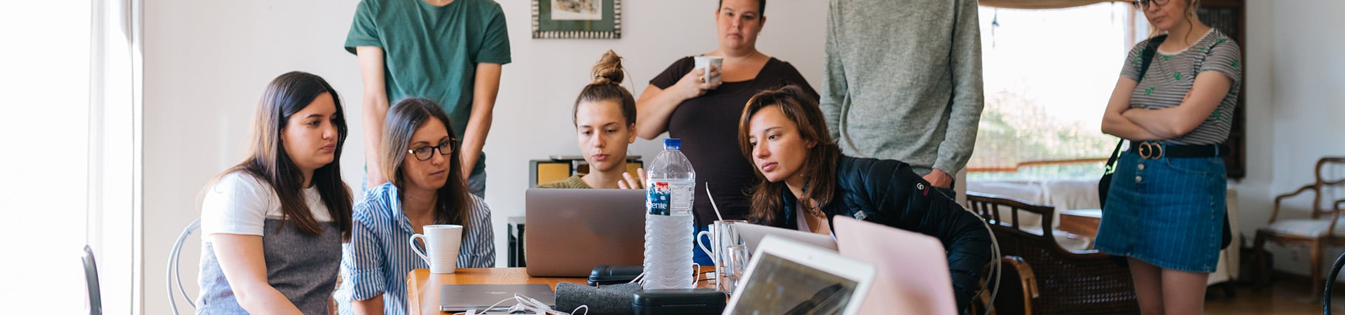 group-around-laptop