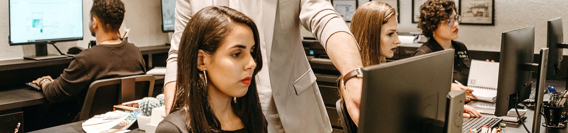 two-people-looking-at-computer-monitor